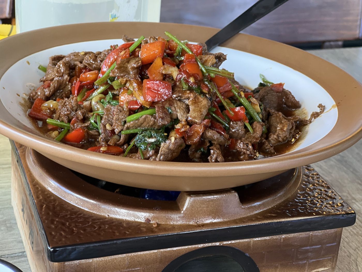 Hot shared dish served on a warmer
